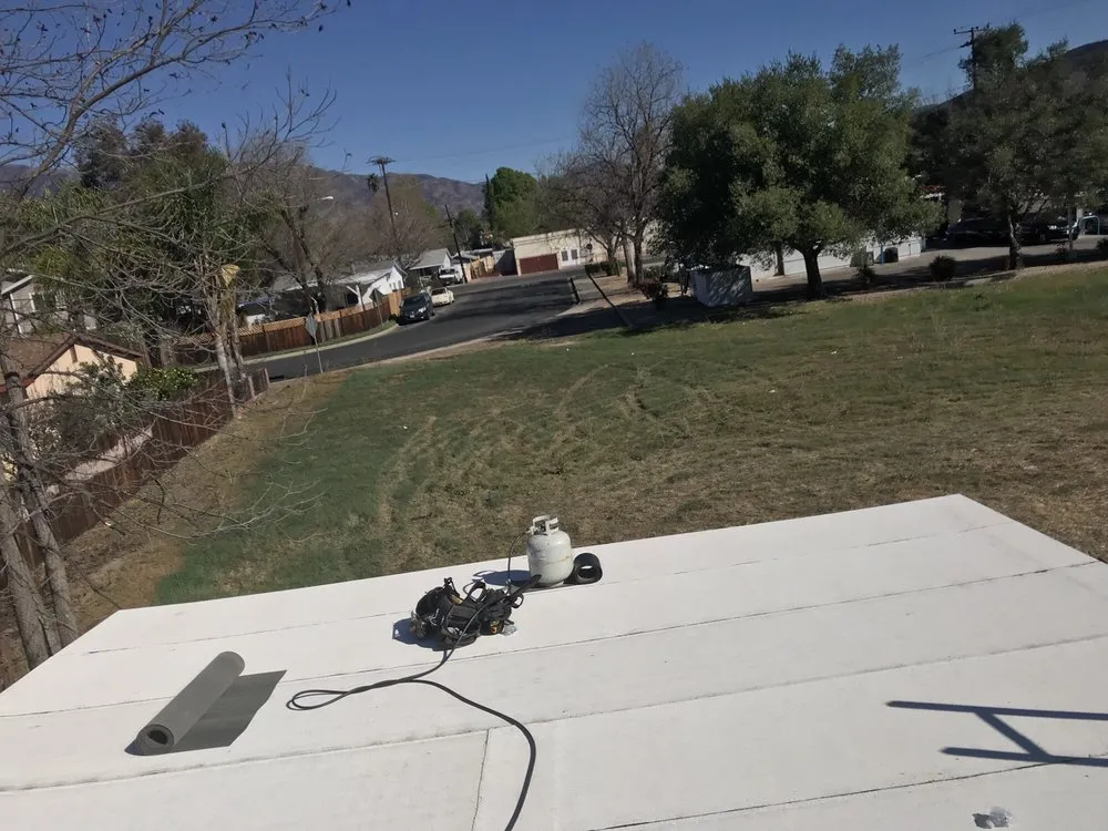 Slide of Aztec Roofing