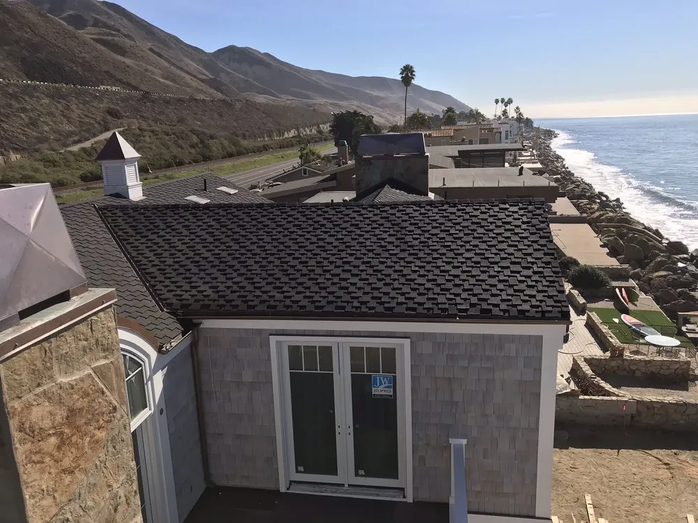 Slide of Aztec Roofing