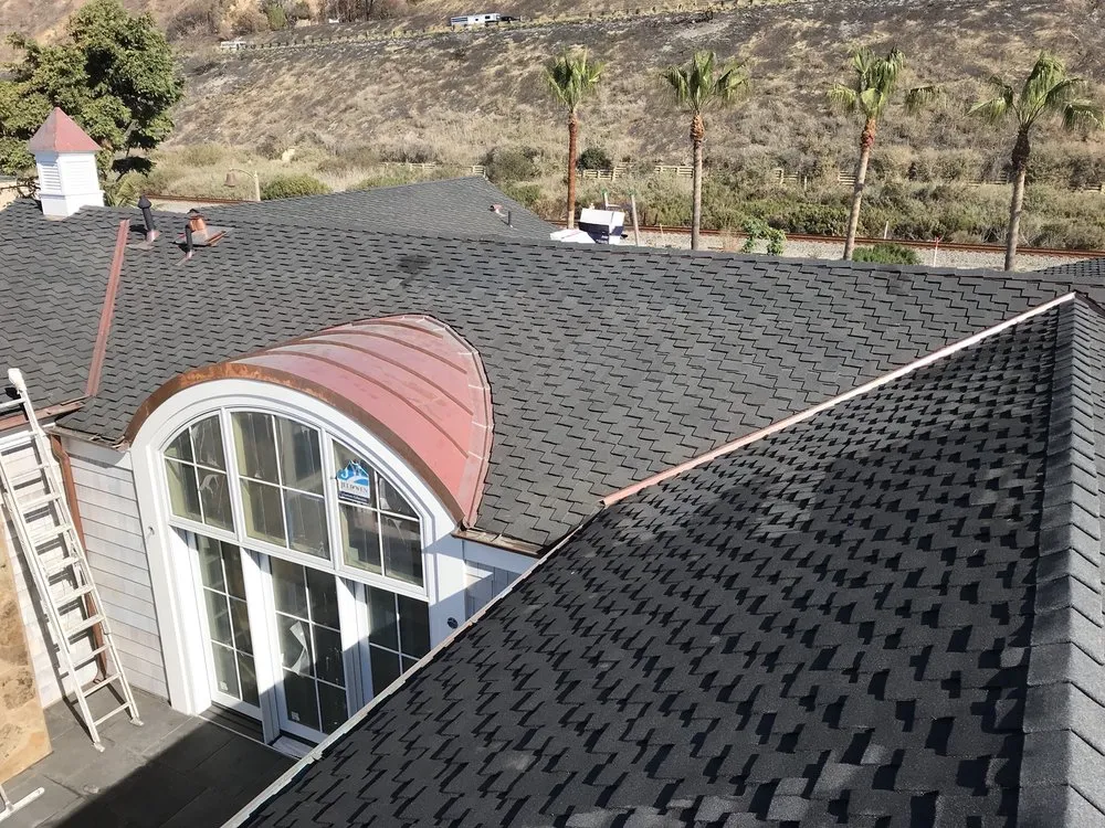 Slide of Aztec Roofing