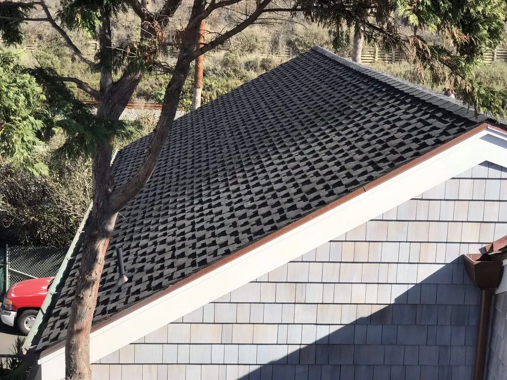 Slide of Aztec Roofing