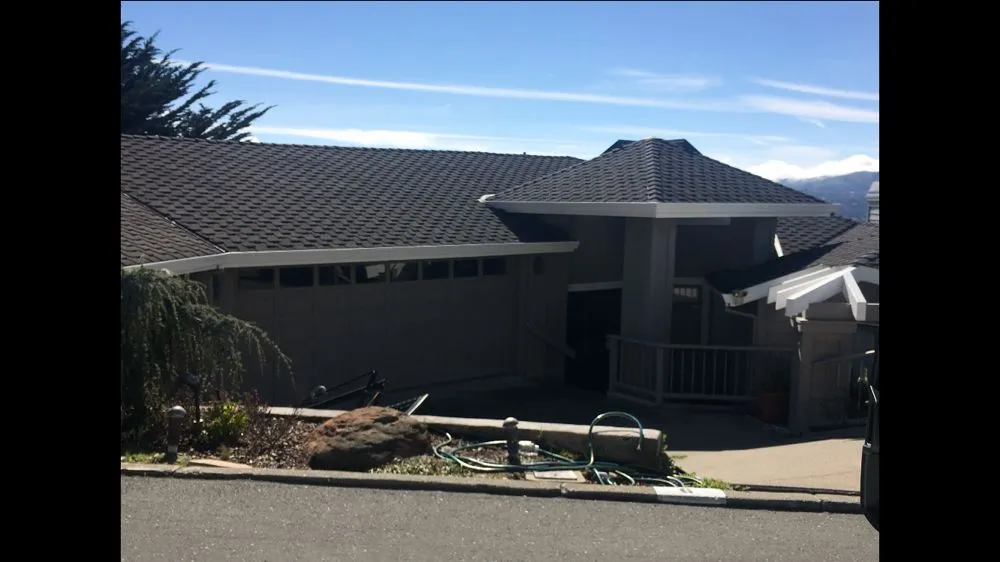 Slide of Aztec Roofing