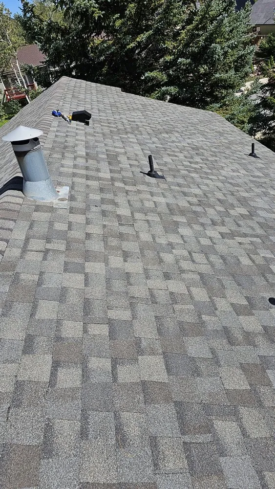 Slide of AZTEC Roofing