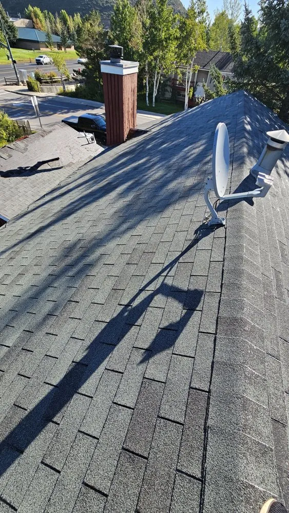 Slide of AZTEC Roofing