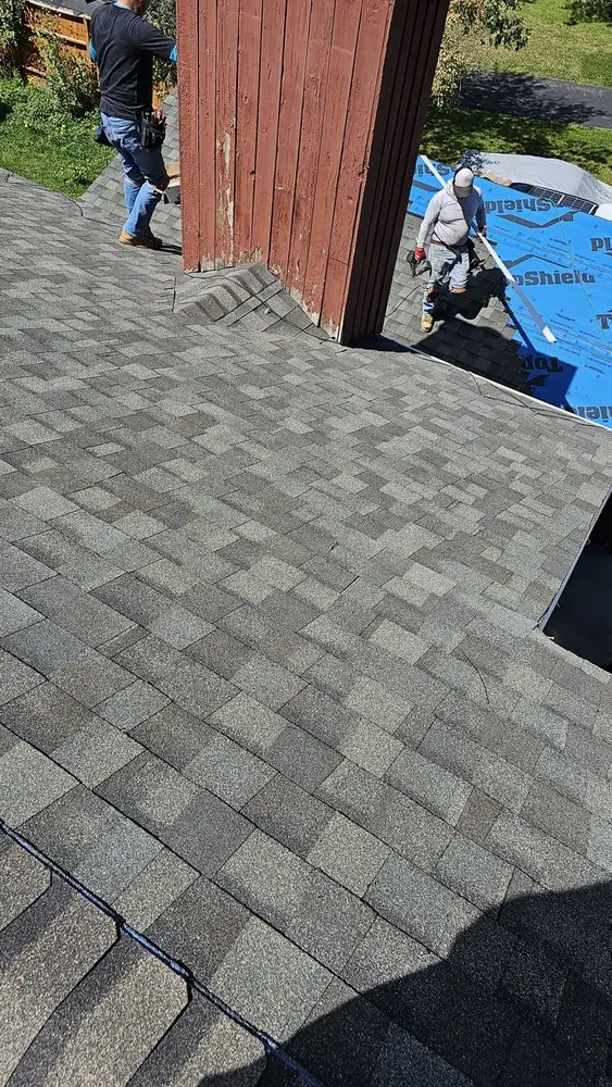 Slide of AZTEC Roofing