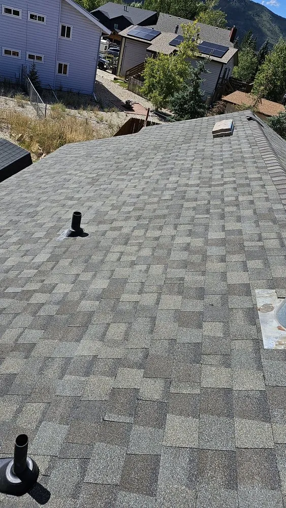 Slide of AZTEC Roofing