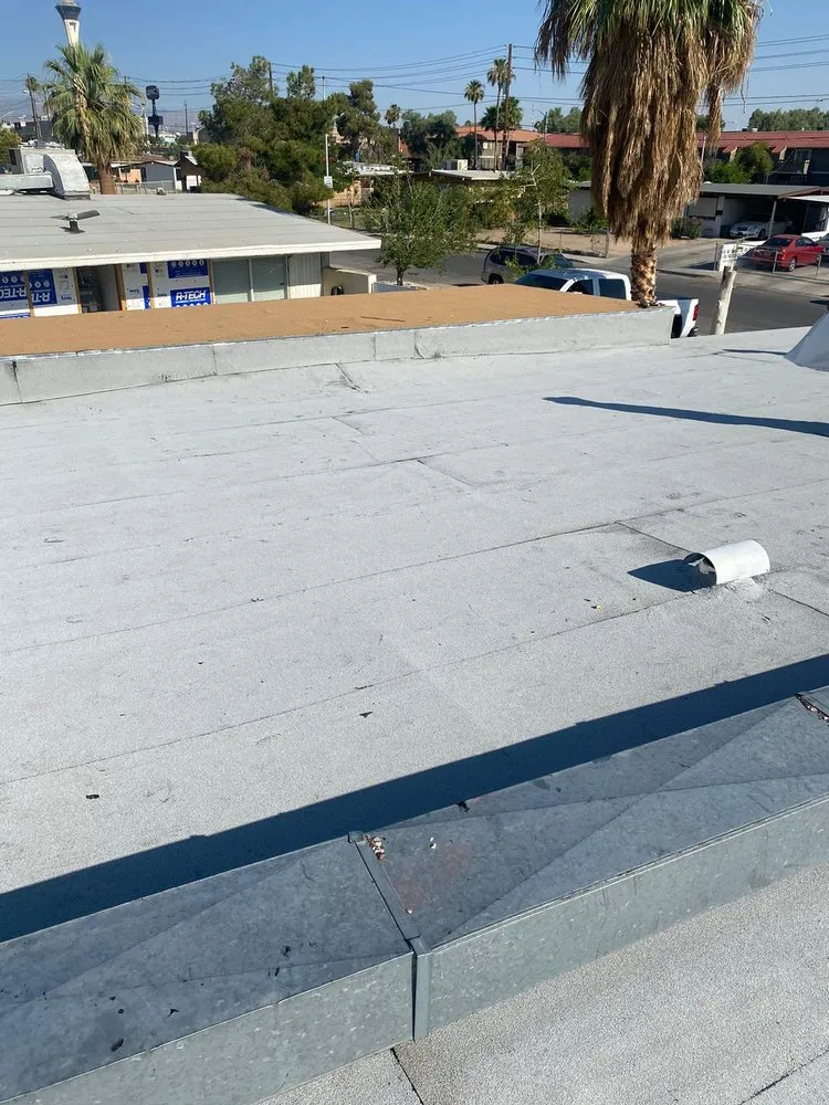 Slide of Aztlan Roofing