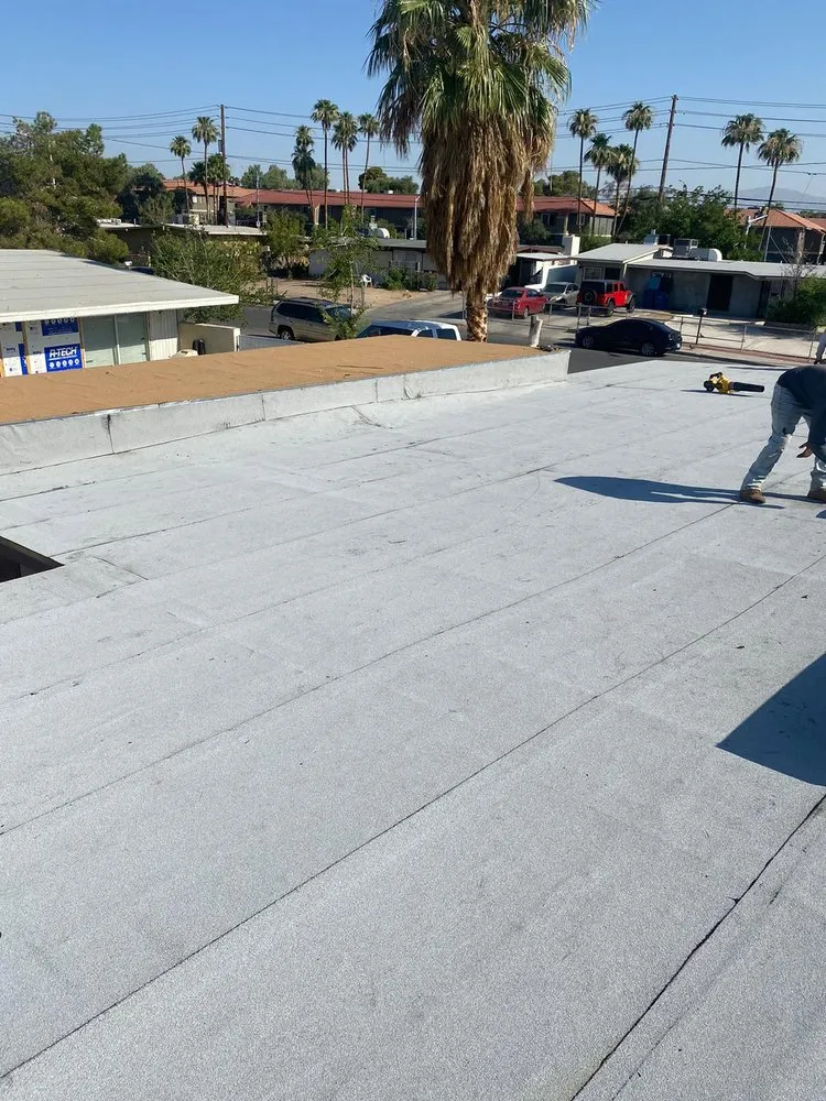 Slide of Aztlan Roofing