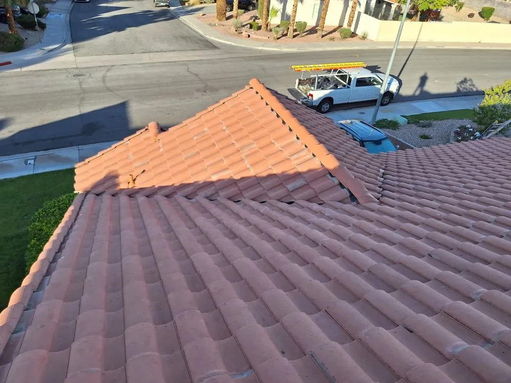 Slide of Aztlan Roofing