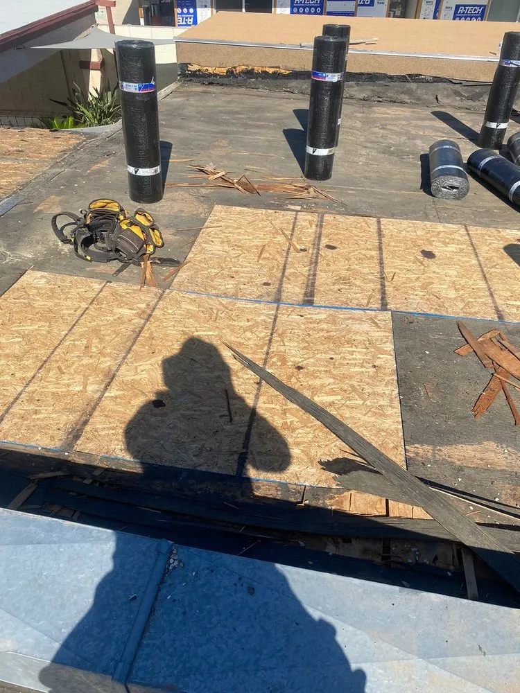 Slide of Aztlan Roofing