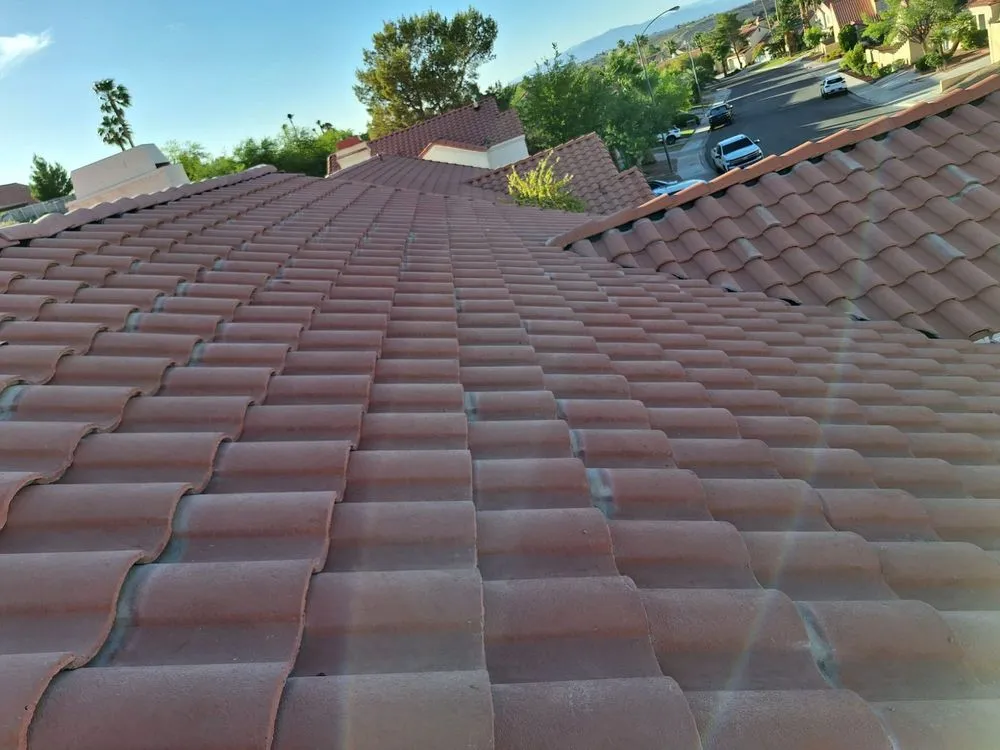 Slide of Aztlan Roofing