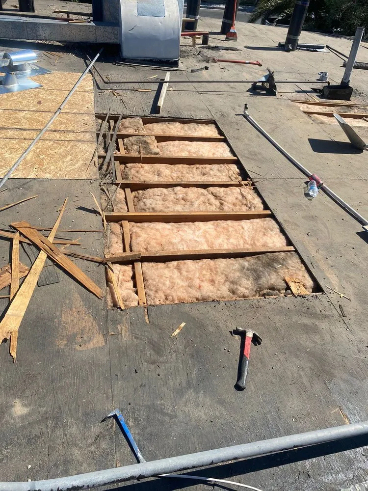 Slide of Aztlan Roofing