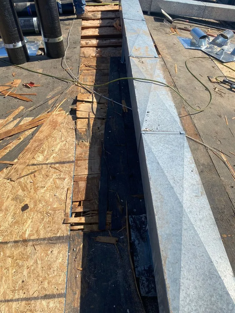 Slide of Aztlan Roofing