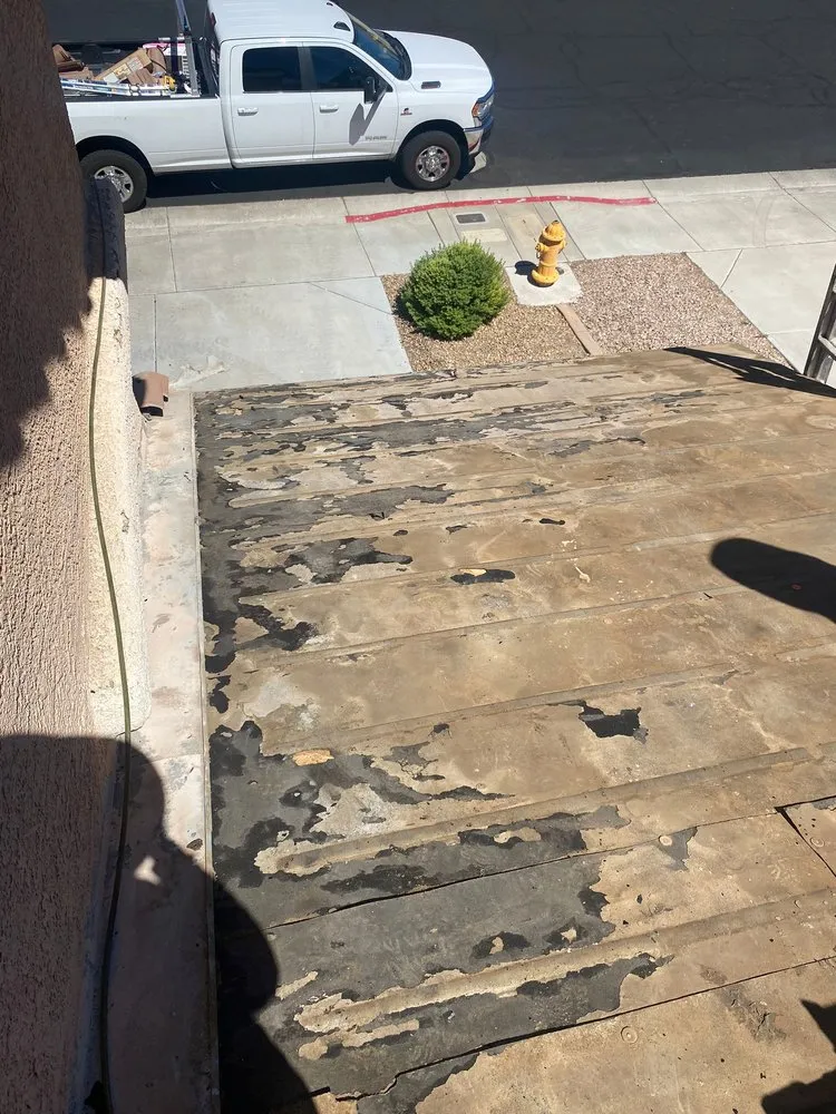 Slide of Aztlan Roofing