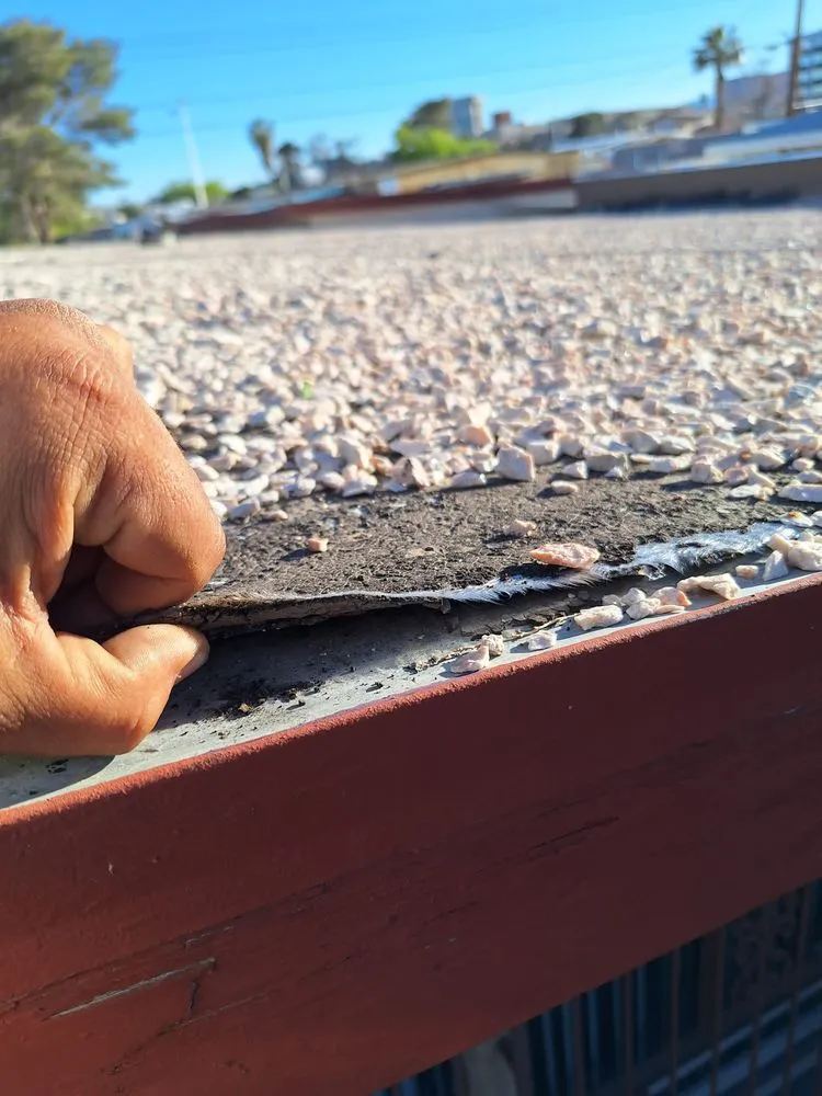 Slide of Aztlan Roofing