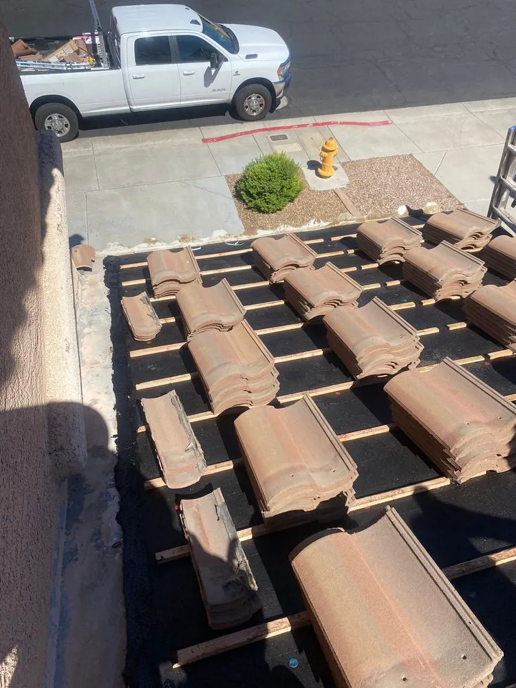 Slide of Aztlan Roofing