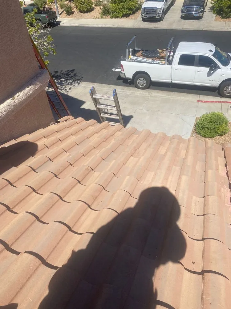 Slide of Aztlan Roofing