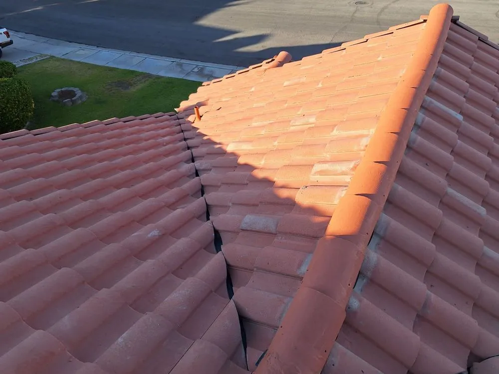 Slide of Aztlan Roofing