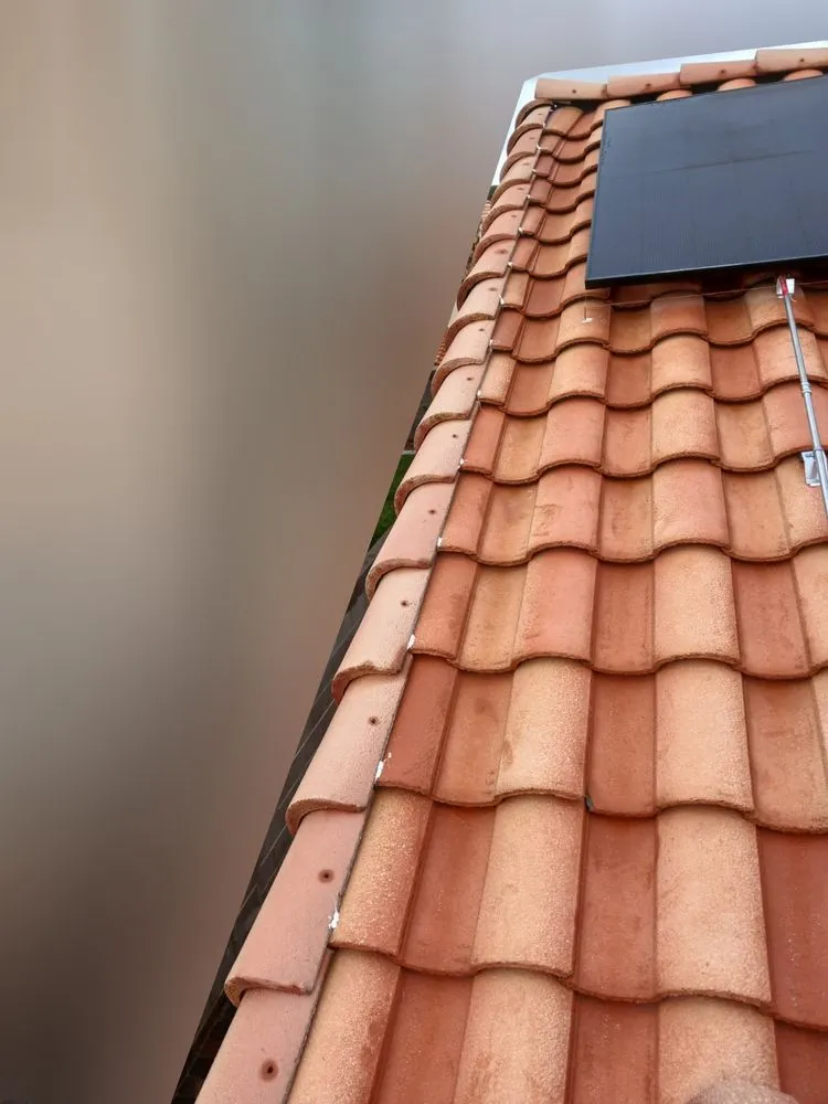 Slide of Aztlan Roofing