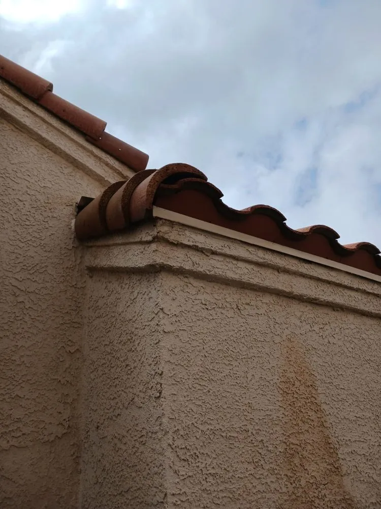 Slide of Aztlan Roofing