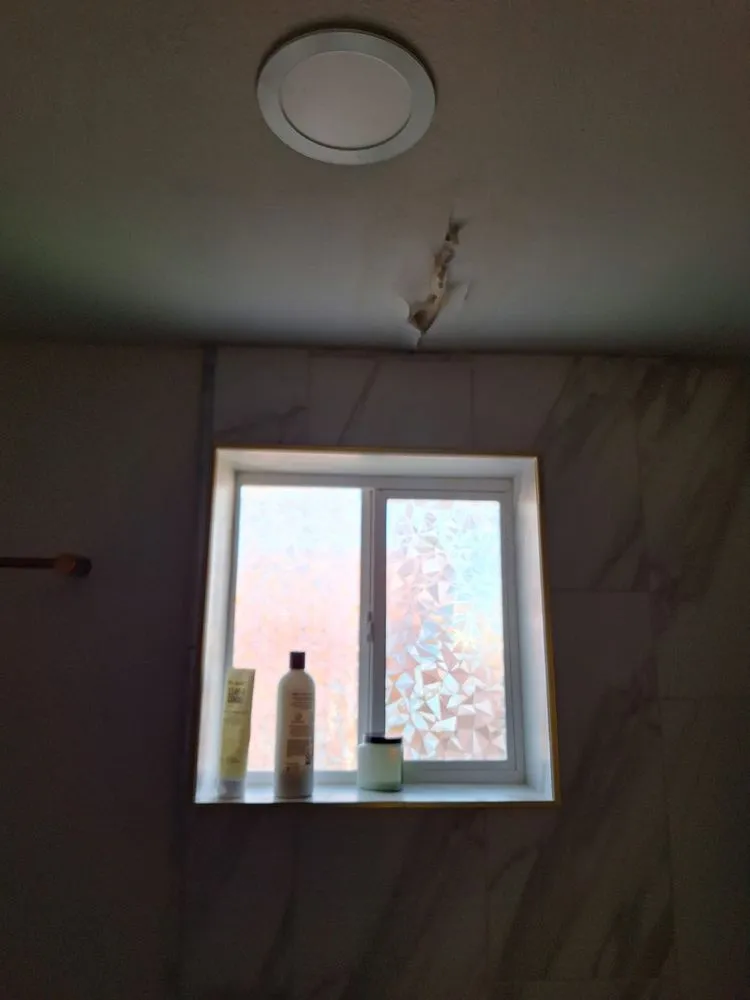 Slide of Aztlan Roofing