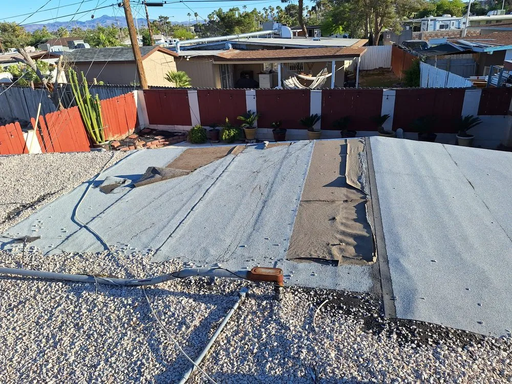 Slide of Aztlan Roofing