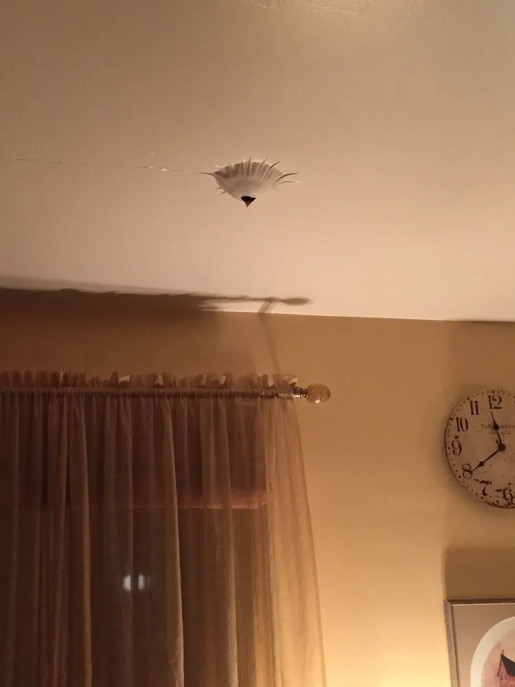 Slide of B & E Roofing