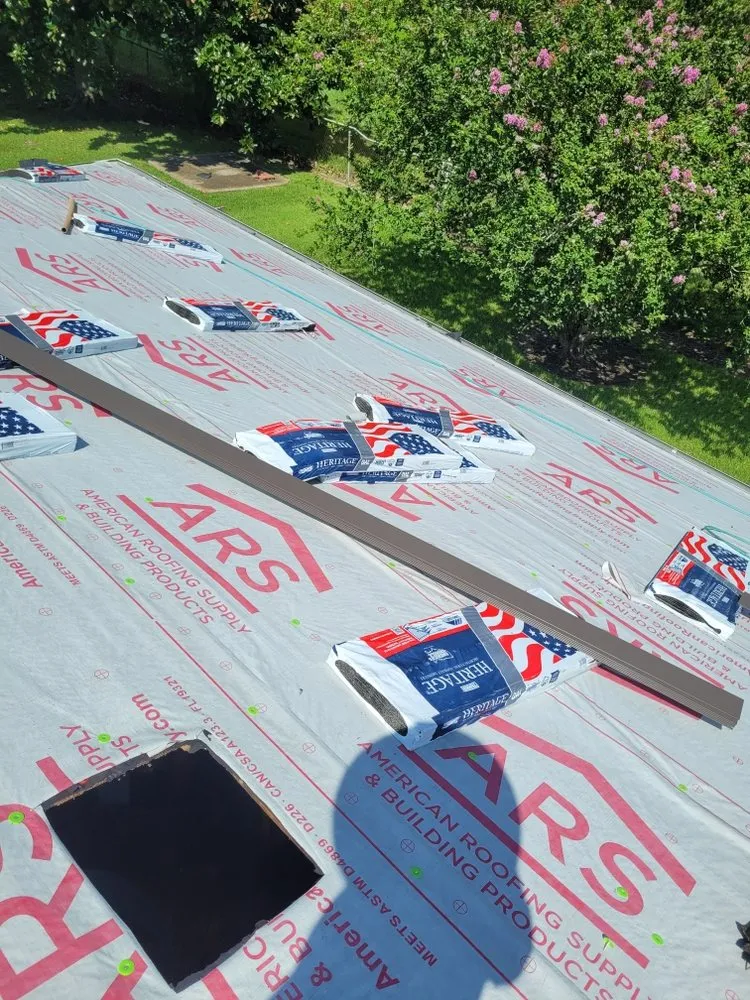 Slide of B & H Roofing