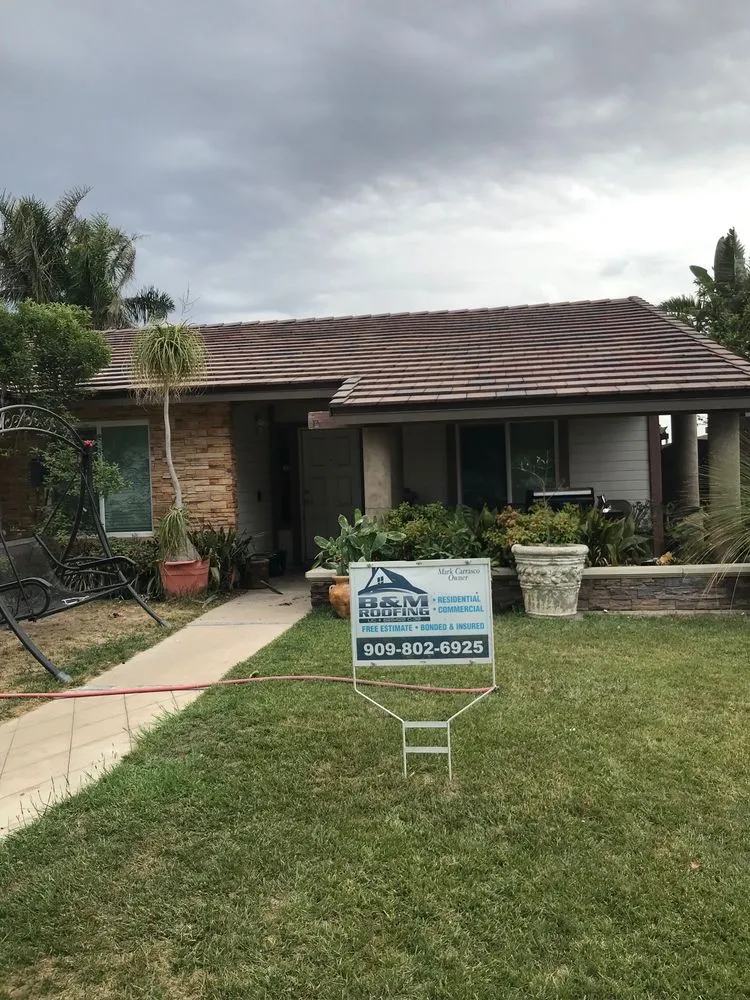 Slide of B & M Roofing