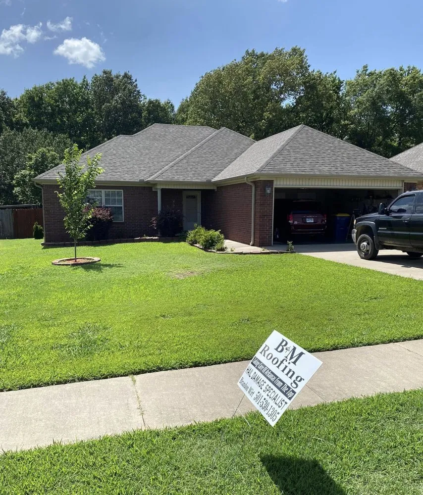 Slide of B & M Roofing