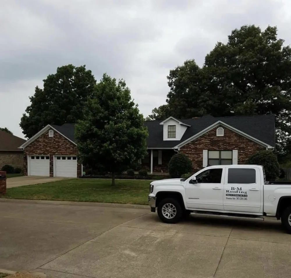 Slide of B & M Roofing