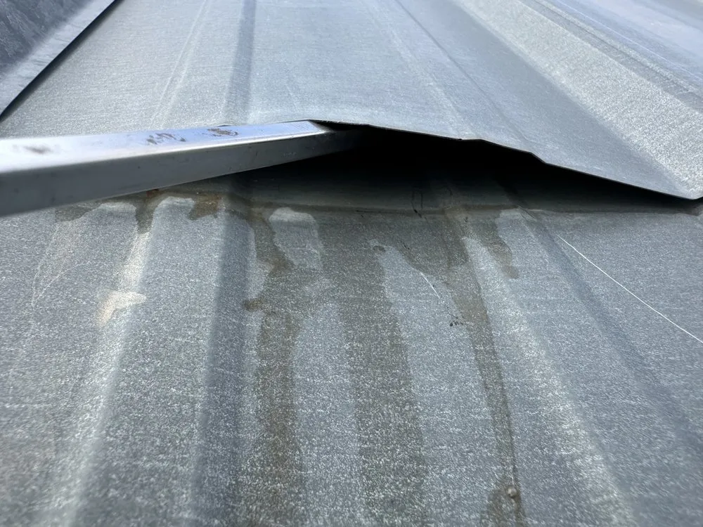 Slide of B E Roofing