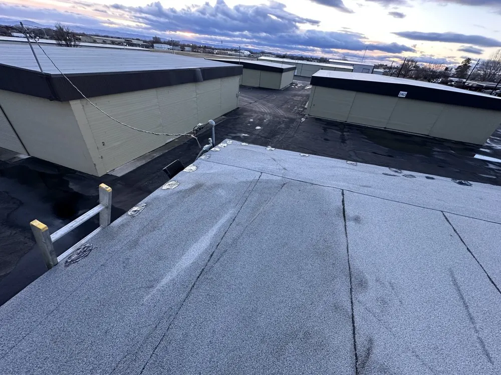 Slide of B E Roofing