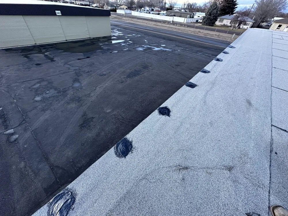 Slide of B E Roofing