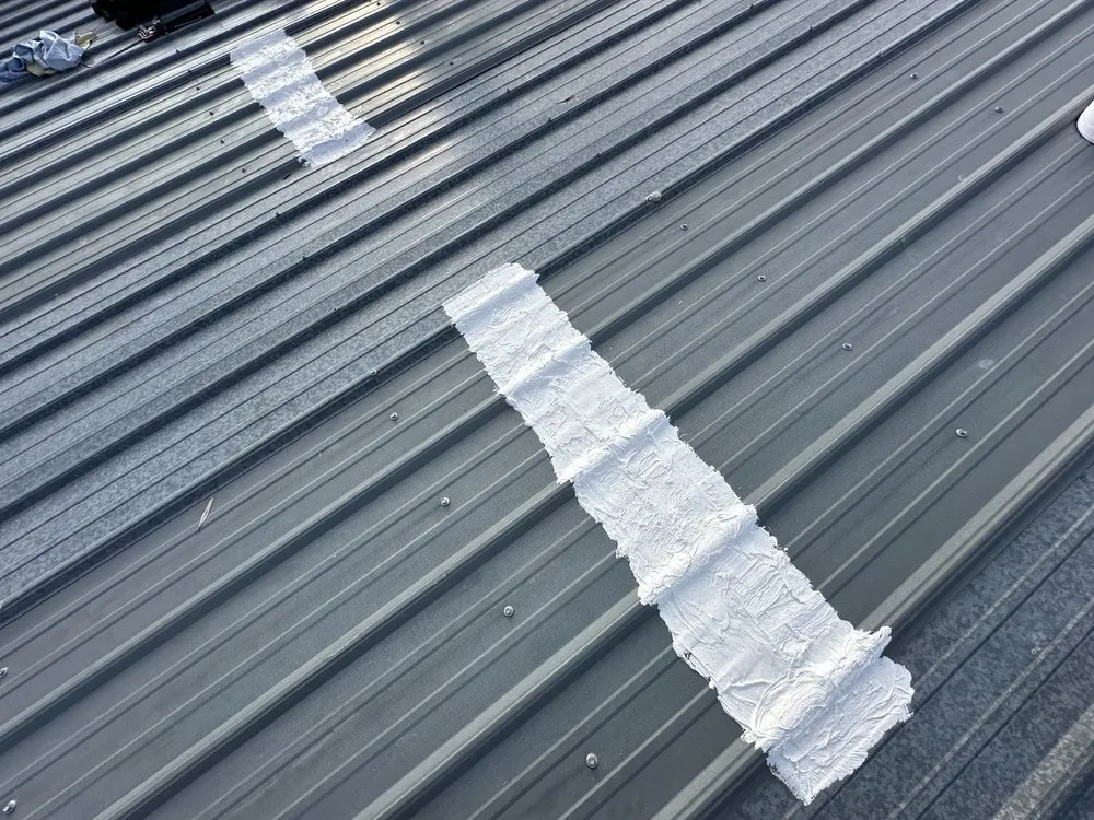 Slide of B E Roofing