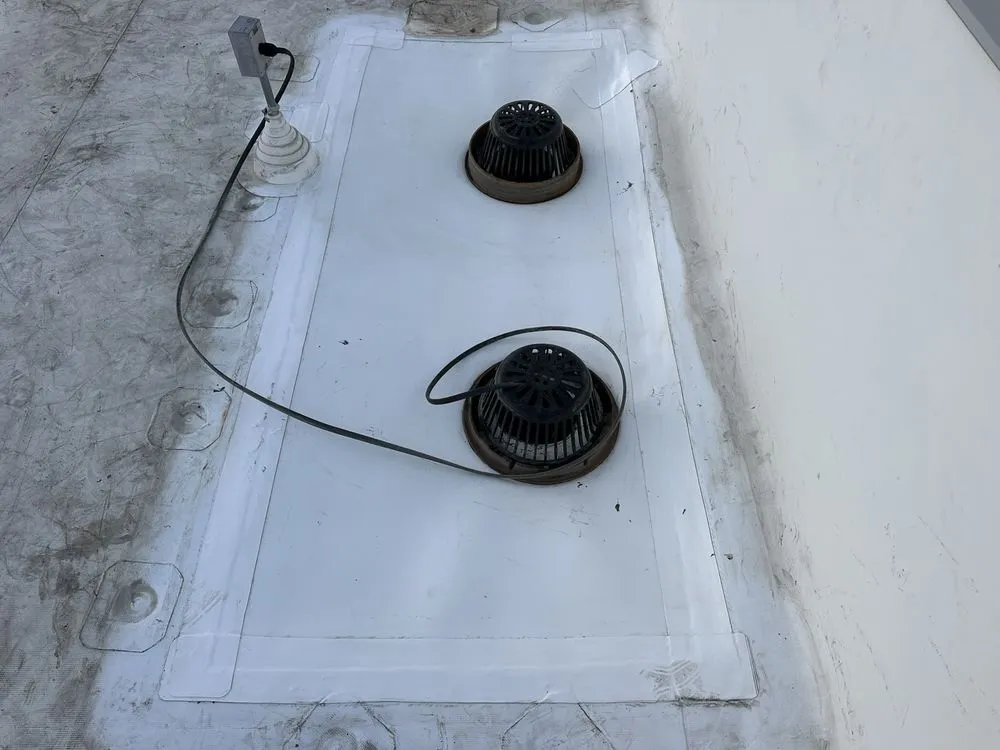 Slide of B E Roofing