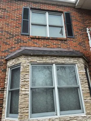 B King Roofing & Exteriors Logo