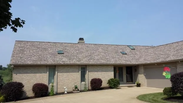 Slide of B M Roofing