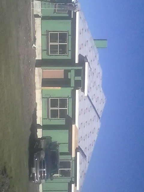 Slide of B-Tex Roofing