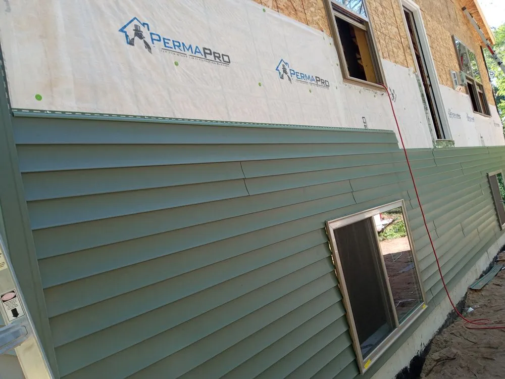 Slide of Baatz Roofing Siding and Construction