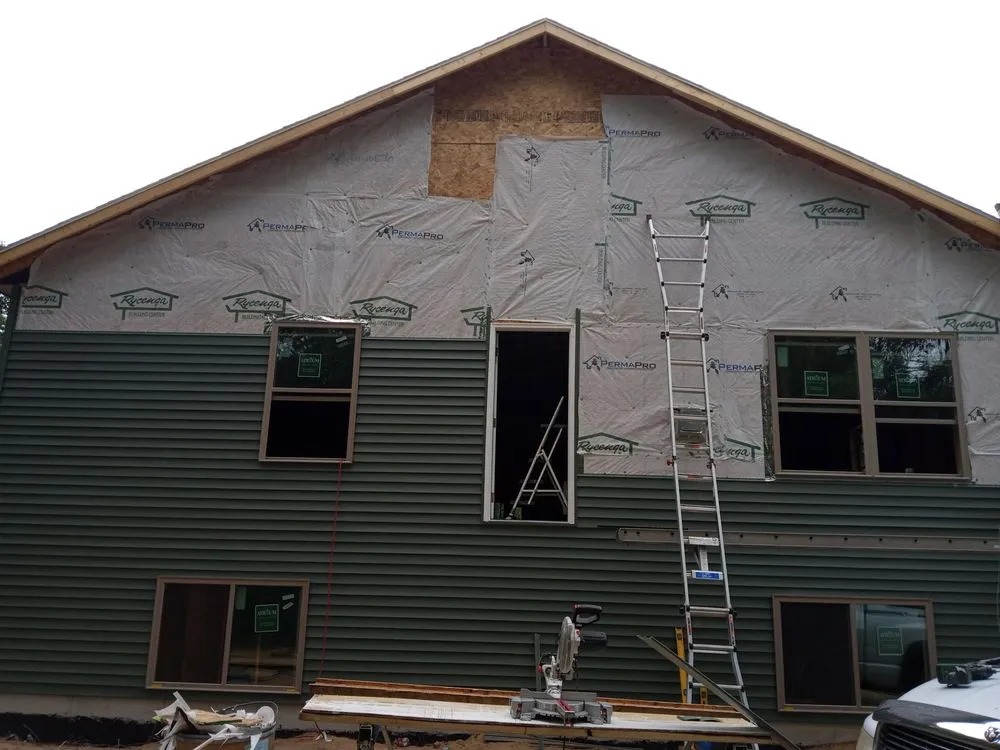 Slide of Baatz Roofing Siding and Construction