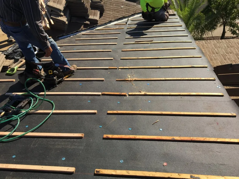 Slide of Baccus Roofing