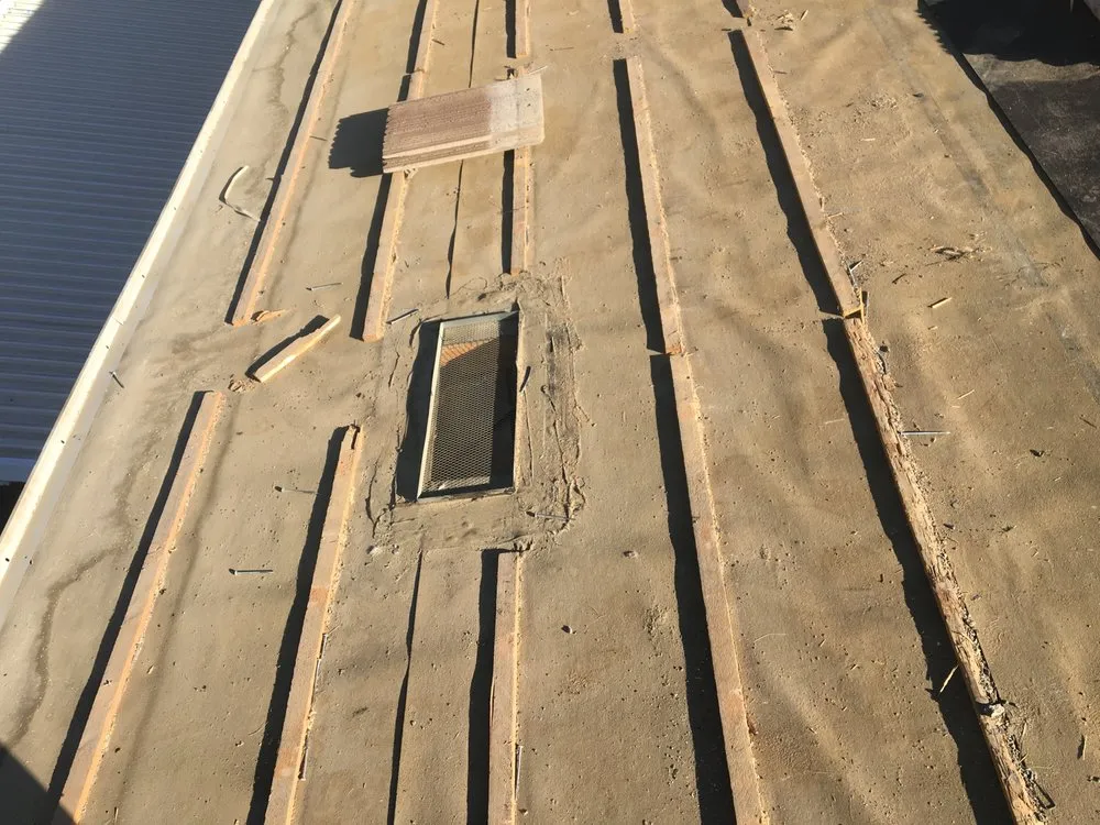 Slide of Baccus Roofing