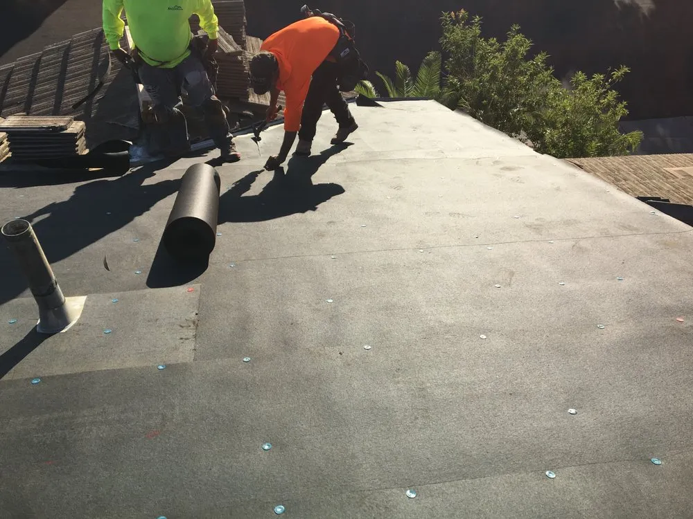 Slide of Baccus Roofing