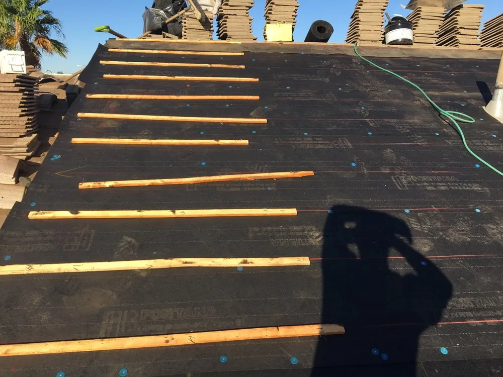 Slide of Baccus Roofing