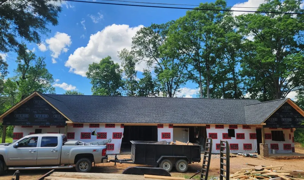 Slide of Backwoods Roofing
