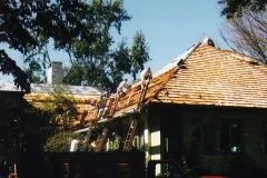 Slide of Baine Roofing