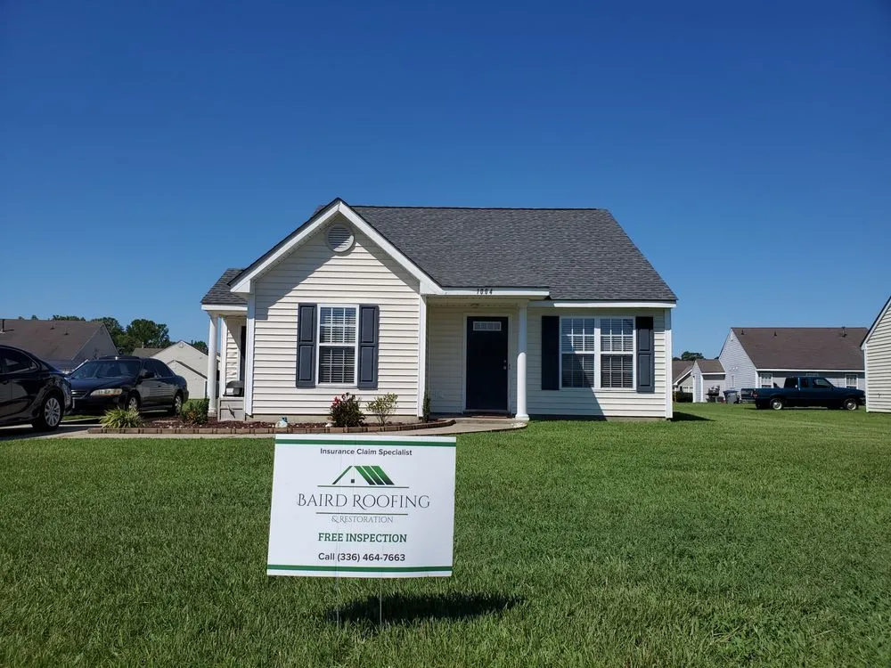 Slide of Baird Roofing & Restoration