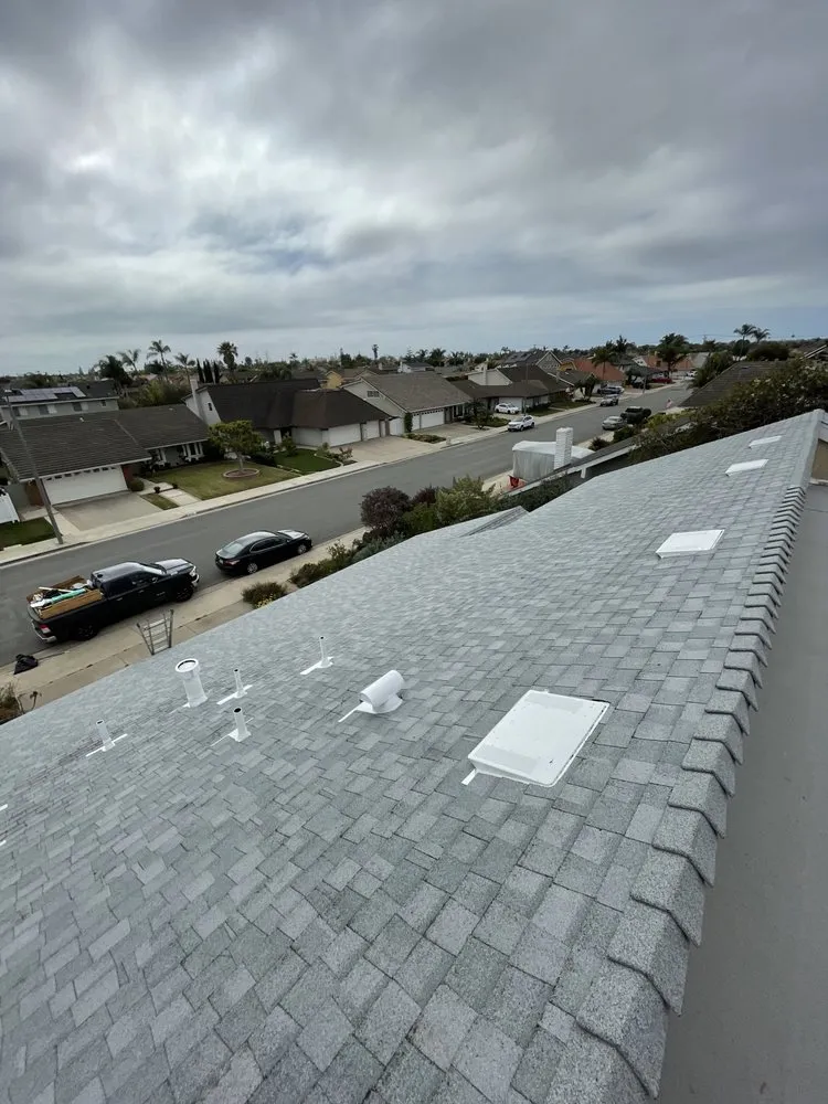 Slide of Baiza's Roofing