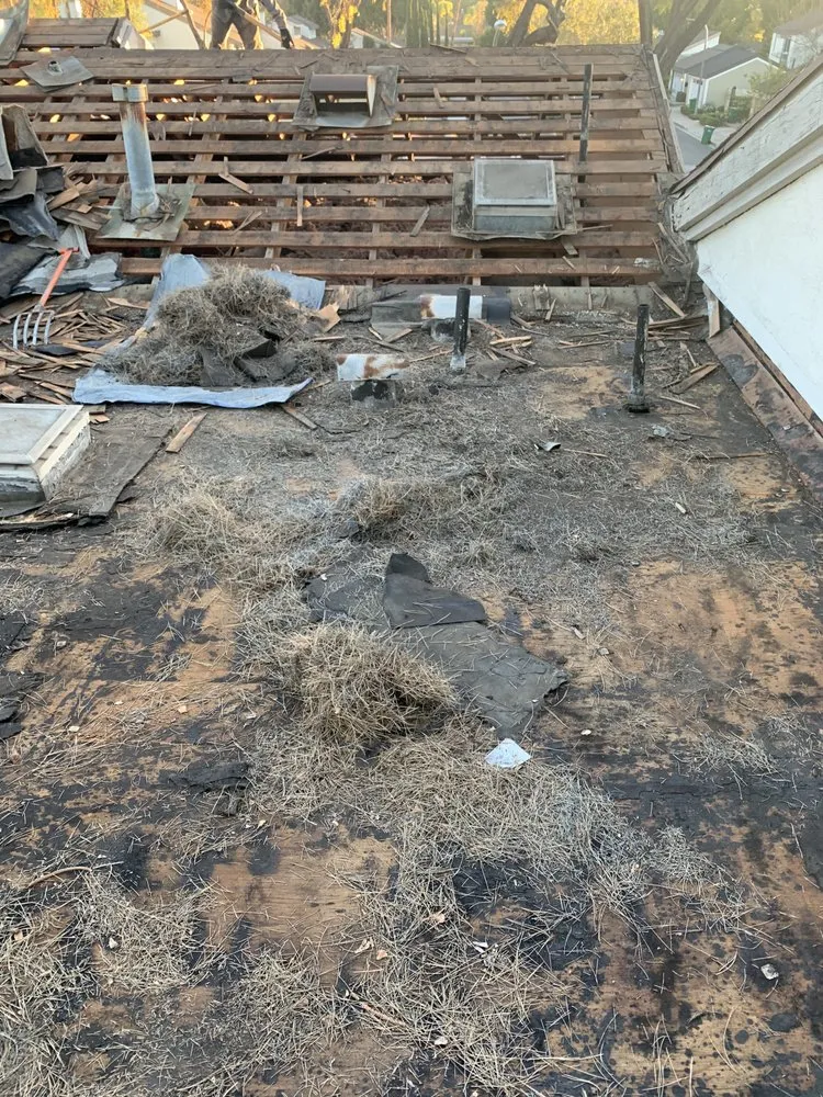 Slide of Baiza's Roofing