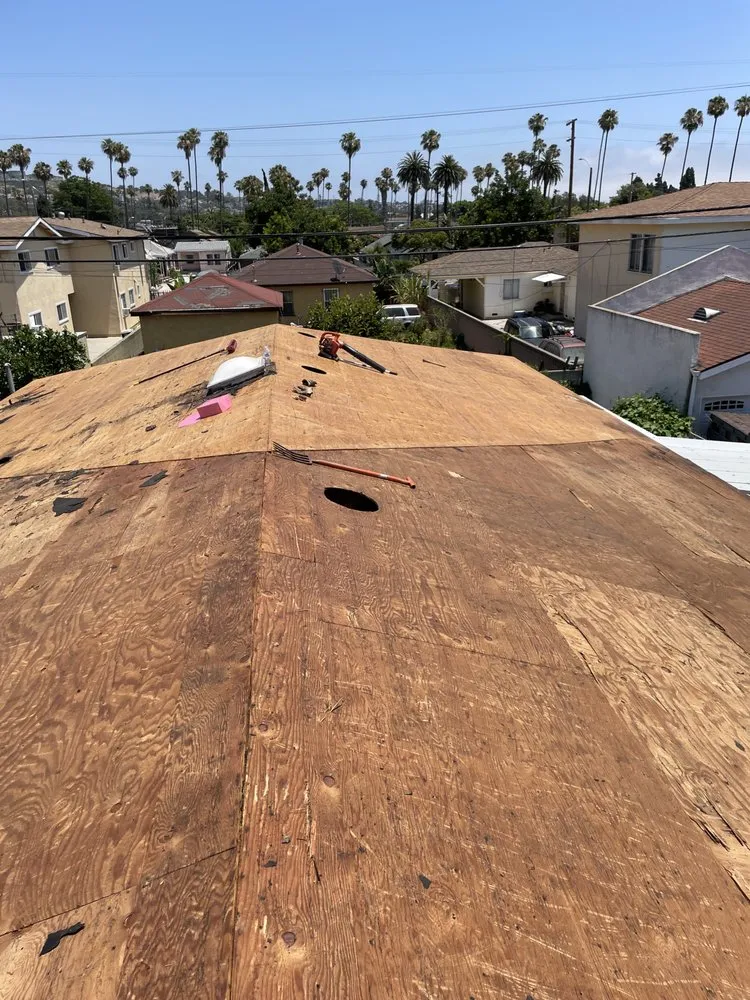 Slide of Baiza's Roofing